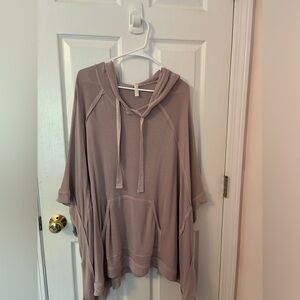 NWT oversized free people movement poncho - size small.